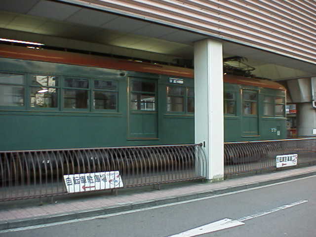 Side view of Tokyu DeHa 3450 (ex. MoHa 510) at Takatsu Station, on 19 Dec 1998.