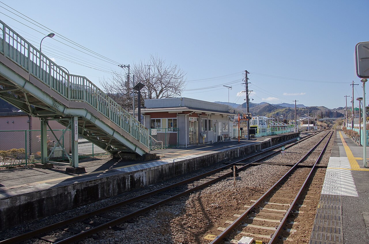 View looking west from the east end of the up platform at Takezawa Station on the Hachiko Line in Sa