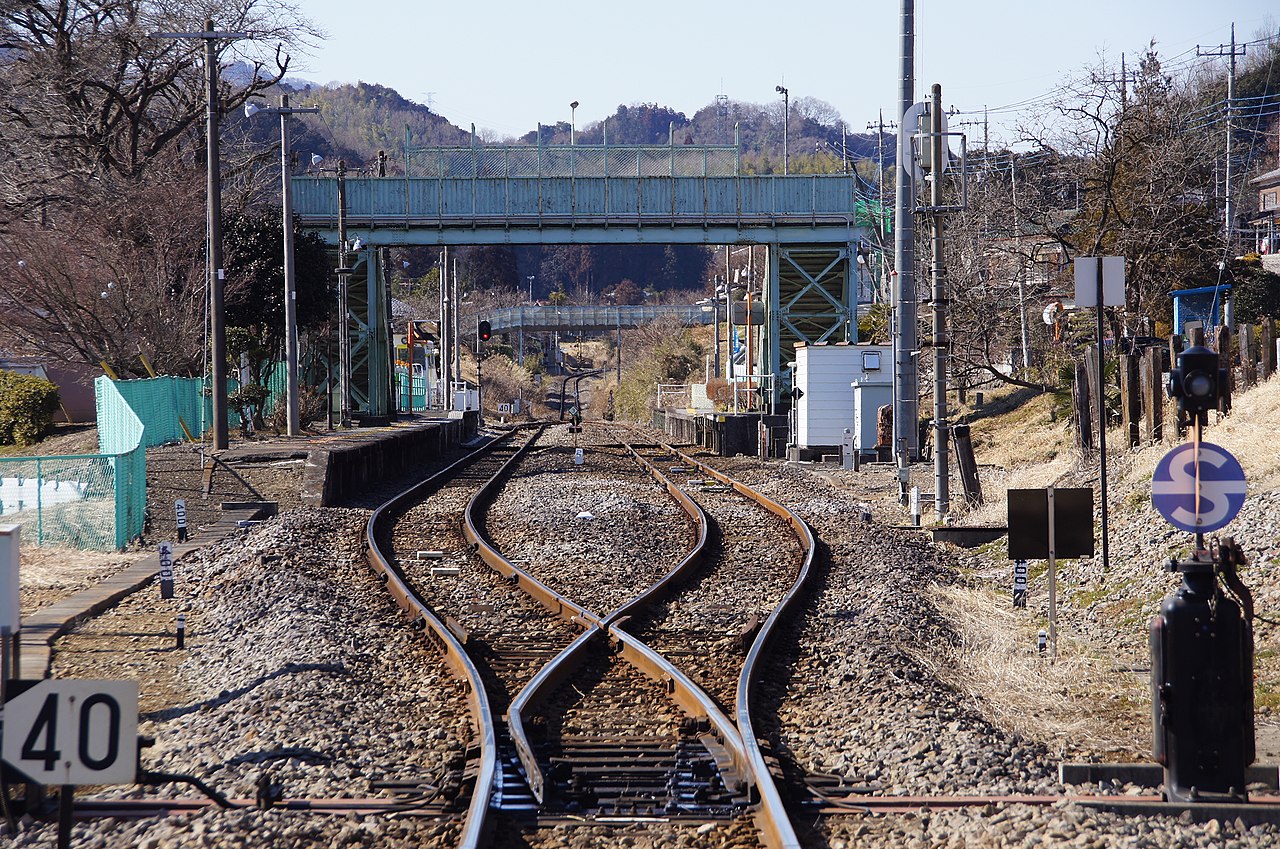 Takezawa Station on the Hachiko Line in Saitama Prefecture, Japan, viewed from the level crossing to
